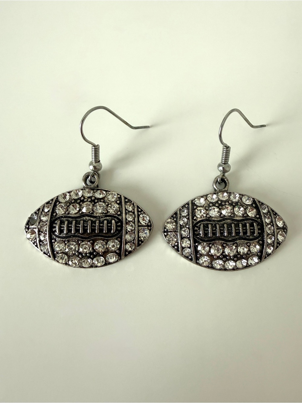Rhinestone Football Dangle Earrings - Silver Tone